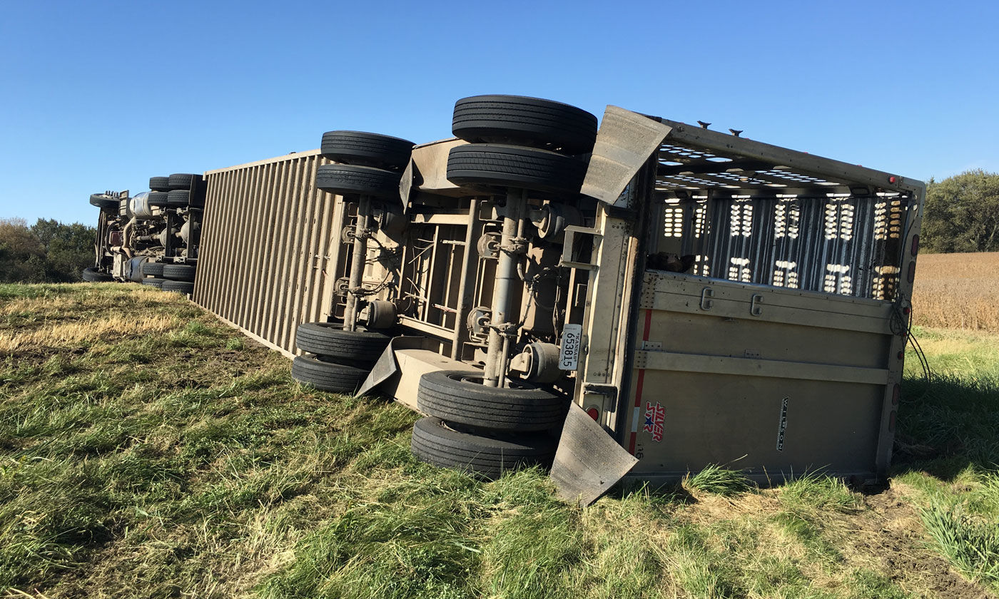 Semi overturns 2